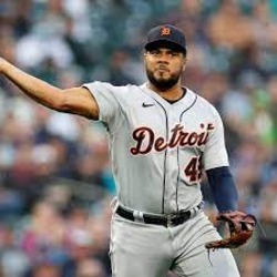 Player has his arm up